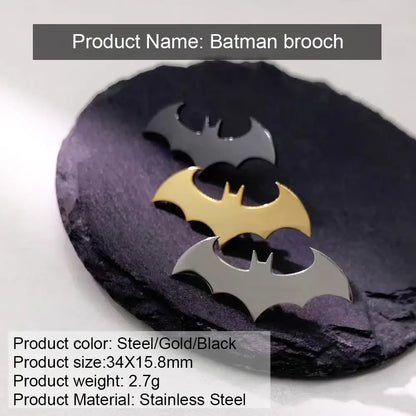 Three stainless steel batman symbol lapel pins in steel, gold, and black finishes for stylish accessorizing