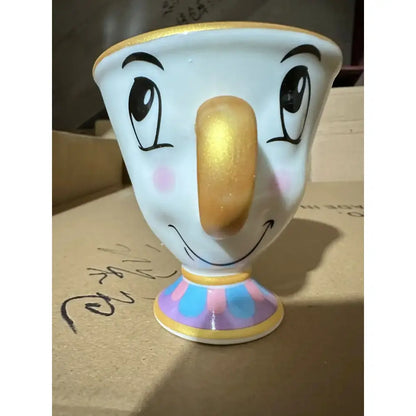 Beauty and the Beast Cogsworth clock figure white ceramic teacup with golden handle candle holder and painted face