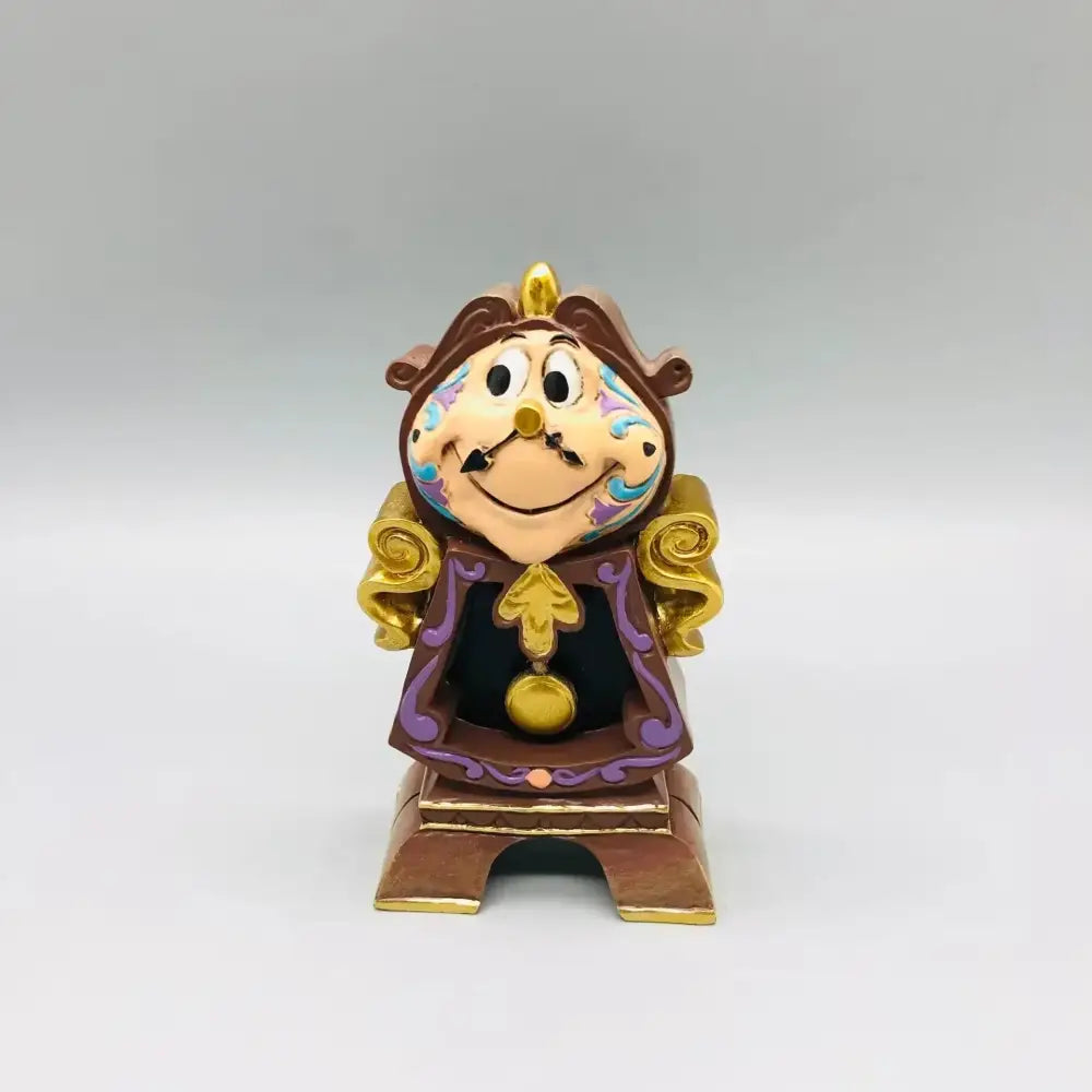 A charming beauty and the beast cogsworth clock figure in brown gold and purple anime decor perfect with lumia candle holder