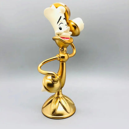 Golden single weight lumia candle holder figurine with smiling face and chef hat from beauty and the beast cogsworth clock figure