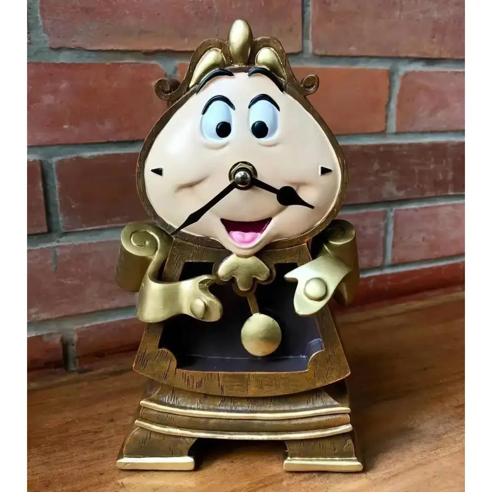 Golden beauty and the beast cogsworth clock figure with ornate design and cheerful face, ideal for lumia candle decor