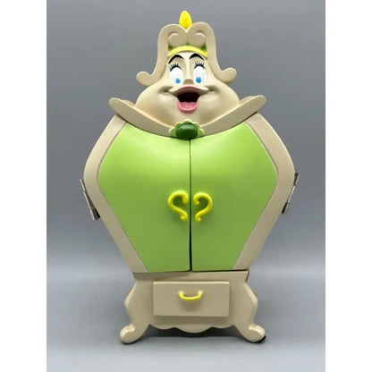 Beauty and the beast cogsworth clock figure with cream and lime green colors and cartoonish face for anime decor or candle holder