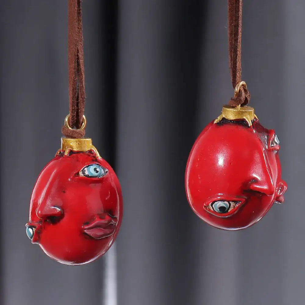 Berserk griffith behelit pendant resin necklace with vibrant red glossy ceramic resin pendant and brown leather cord