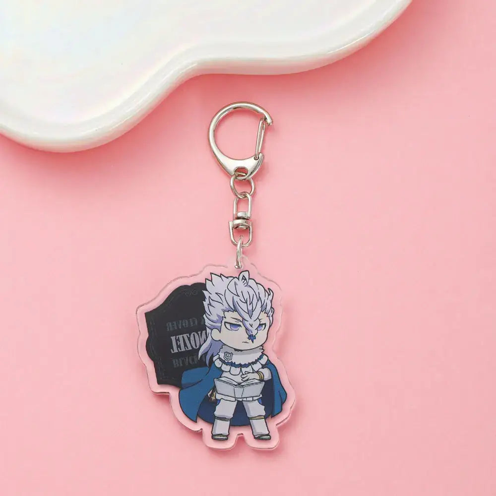Clear acrylic black clover asta keychain featuring chibi white hair character with blue cape and silver armor backpack charm