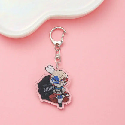 Clear acrylic black clover asta keychain featuring chibi blonde character with face paint and red cape backpack charm