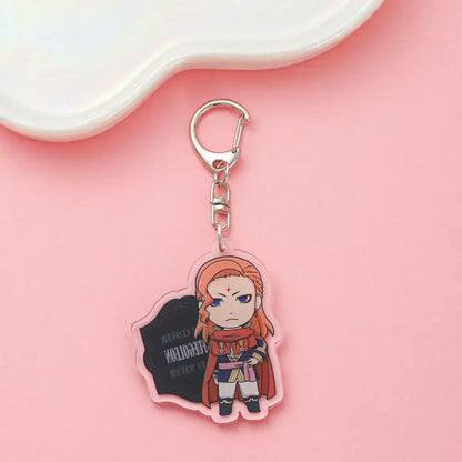 Pink acrylic black clover asta keychain featuring chibi character with orange hair and red cape for cute backpack charm