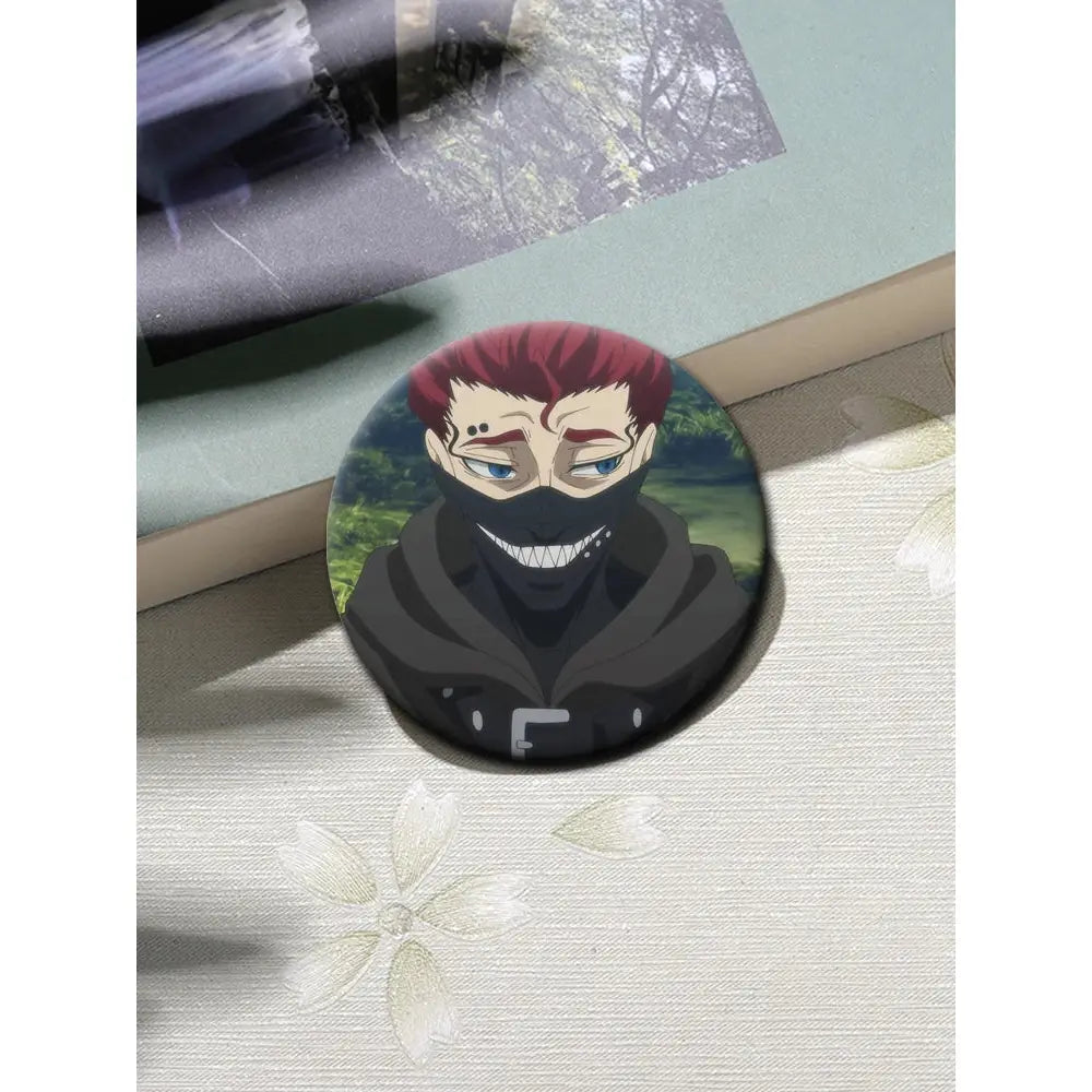 Circular tinplate black clover asta button pin featuring red hair anime character with blue eyes and black mask