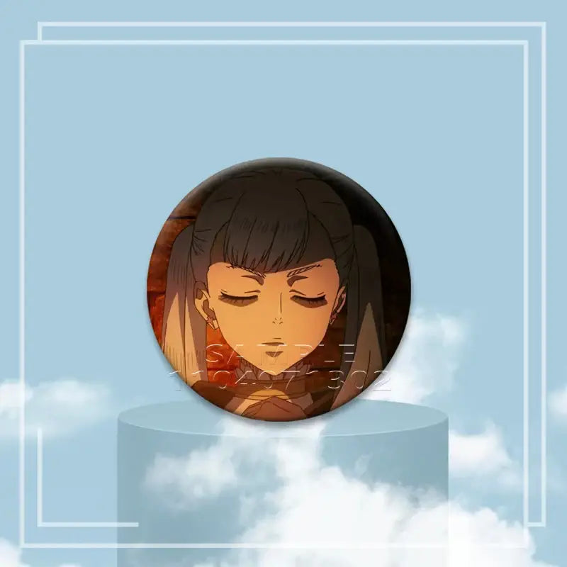 Circular black clover asta button pin featuring an anime character with dark pigtails on a glossy tinplate badge