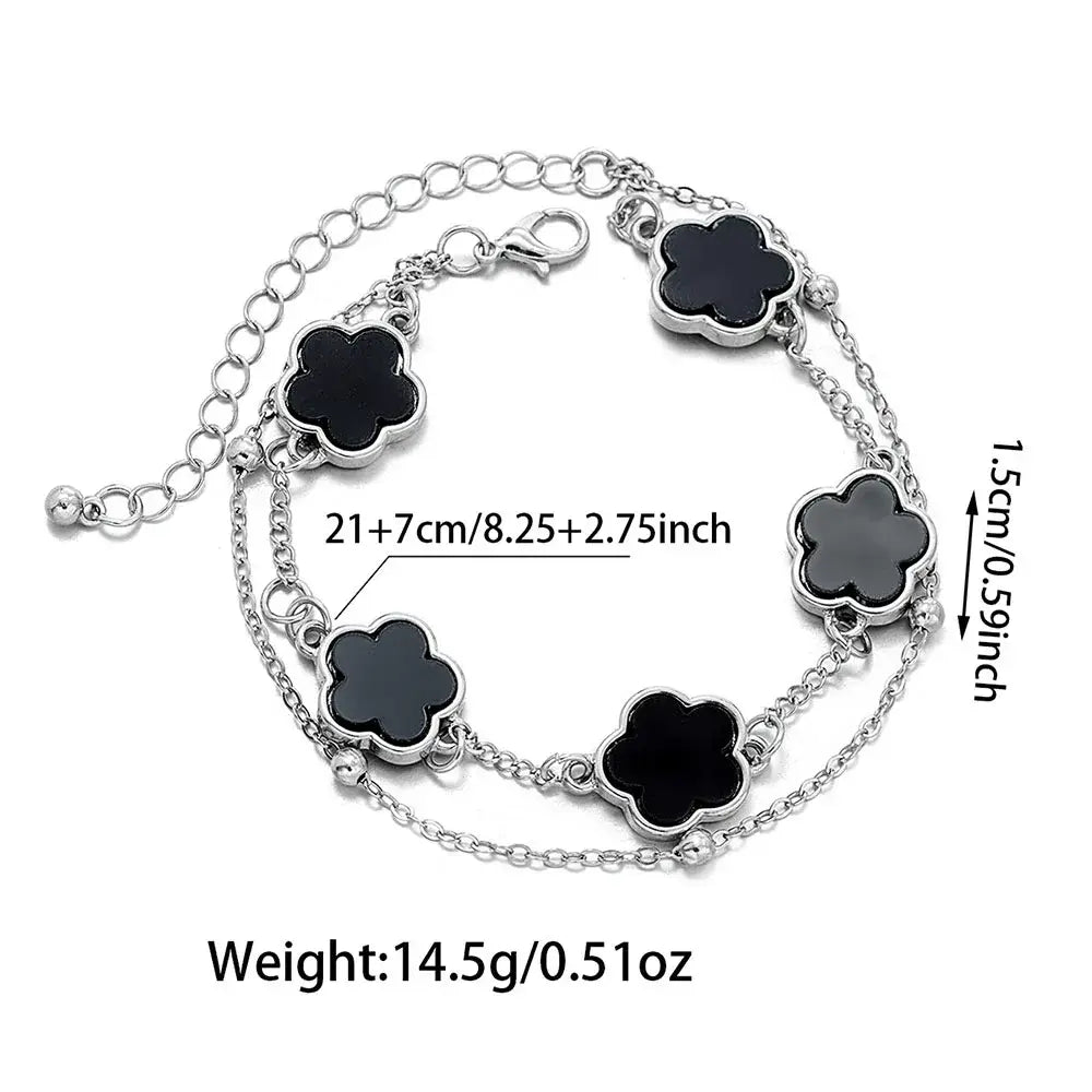 Silver chain wrist chain with five polished black clover asta charm for stylish five-leaf clover asta look