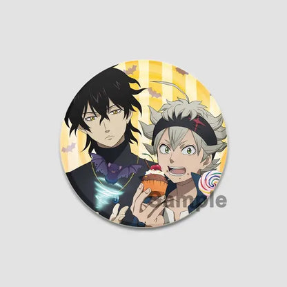 Circular black clover asta lapel pin with two anime characters on yellow striped background with bats and cupcake
