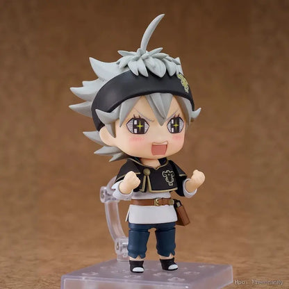 Chibi black clover Asta nendoroid figure with spiky silver hair, black headband, gold trim, and replaceable face feature