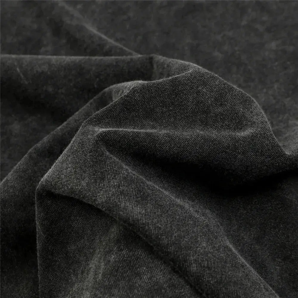 Soft textured dark gray washed cotton fabric with subtle heathered weave on black clover asta oversized t shirt