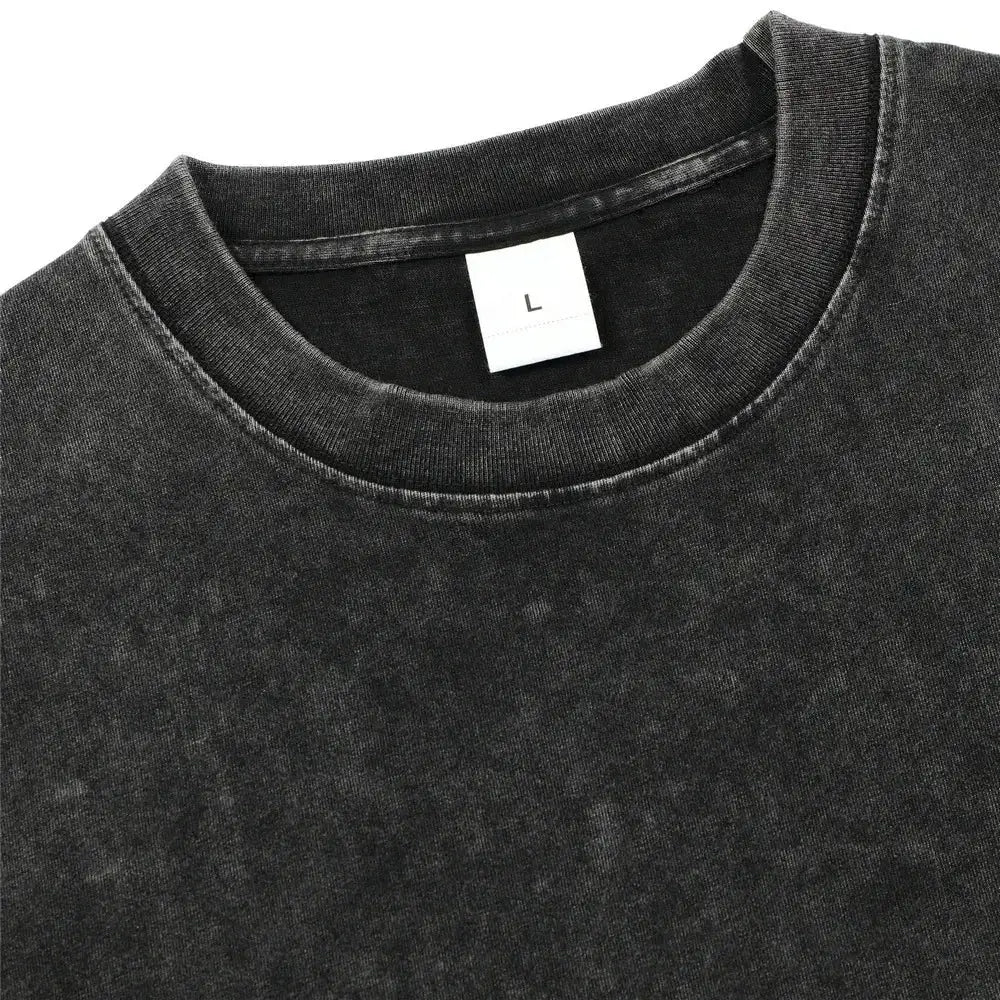 Black clover asta oversized t-shirt in black distressed washed cotton with a white size label inside the collar
