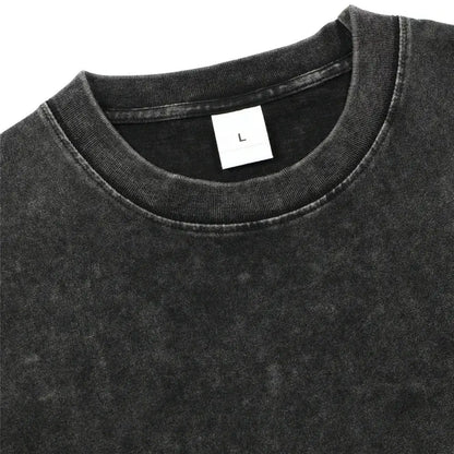 Black clover asta oversized t-shirt in black distressed washed cotton with a white size label inside the collar