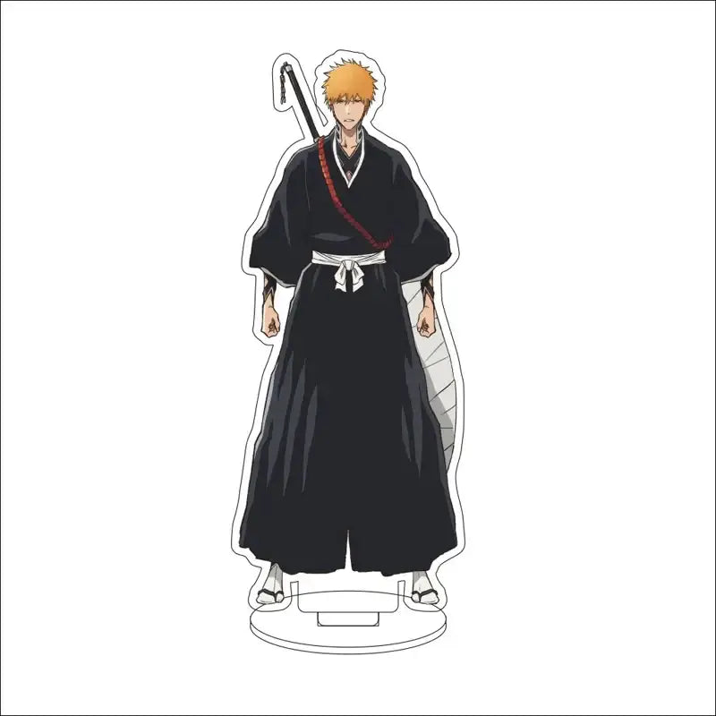 Black acrylic standee of bleach character ichigo kurosaki in shinigami uniform with orange hair and sword on back, 16cm display figure
