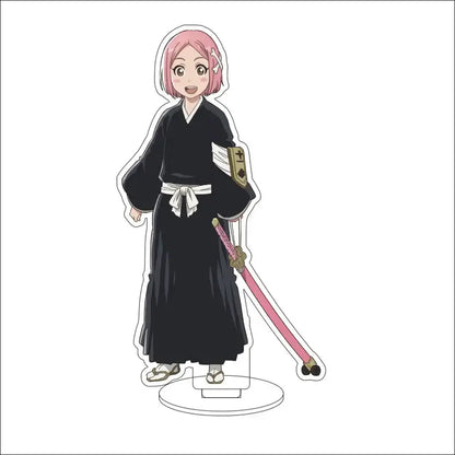 Bleach character acrylic standee featuring pink-haired anime figure in black traditional outfit with white sash and pink sword accessory