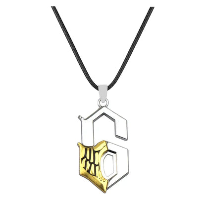 Silver and gold two-tone zinc alloy sword keychain pendant featuring stylized s with intricate skeletal hand design