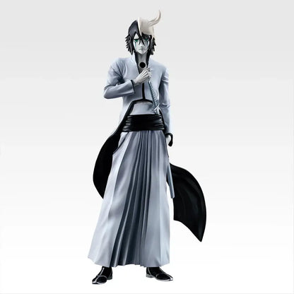 Detailed pvc figurine of ichiban kuji bleach character with black and white hair green eyes in a gray robe holding a sword