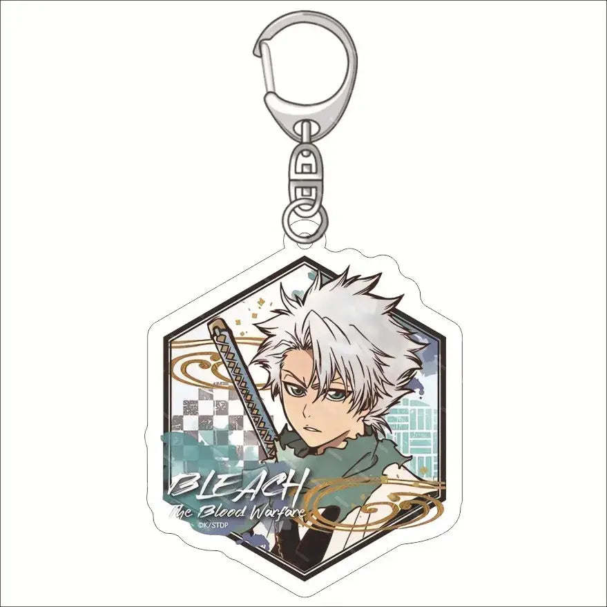 Silver hexagonal acrylic keychain featuring bleach ichigo anime character with spiky white hair and green scarf holding sword