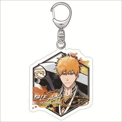 Clear acrylic keychain featuring ichigo kurosaki illustration with hexagonal frame and orange black watercolor accents