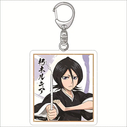 Silver-toned acrylic keychain featuring rukia kuchiki illustration in traditional attire holding a sword from bleach ichigo