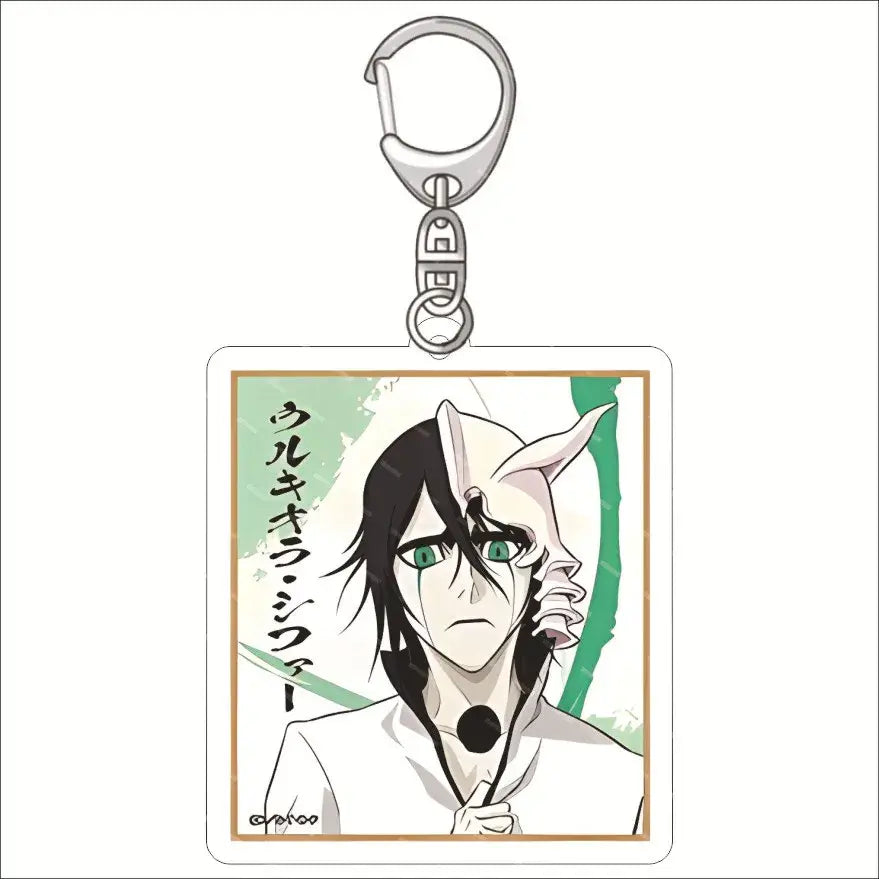 Silver metal acrylic keychain featuring a rectangular charm with ulquiorra cifer illustration from bleach in white uniform