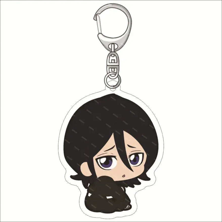 Black acrylic keychain featuring chibi-style bleach ichigo with short black hair and purple eyes in a dark outfit