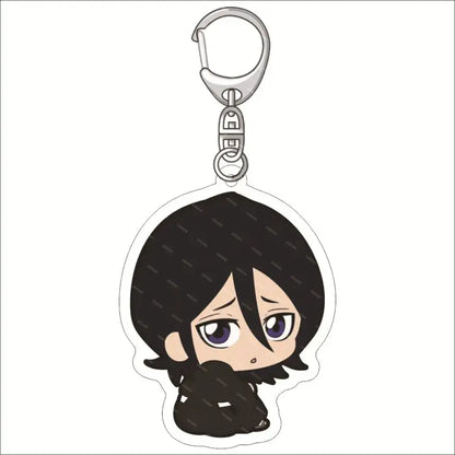 Black acrylic keychain featuring chibi-style bleach ichigo with short black hair and purple eyes in a dark outfit