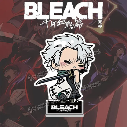 Bleach ichigo acrylic stand featuring a chibi white-haired character with black sword on a clear anime collection base