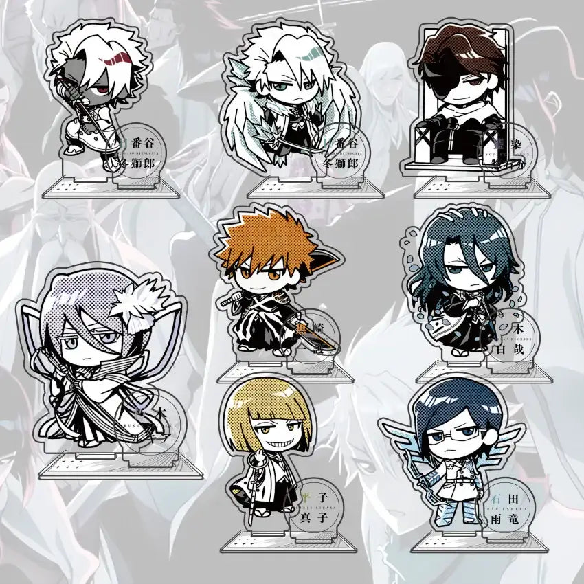 Set of seven black and white bleach ichigo acrylic standee figures in chibi style with japanese text labels below