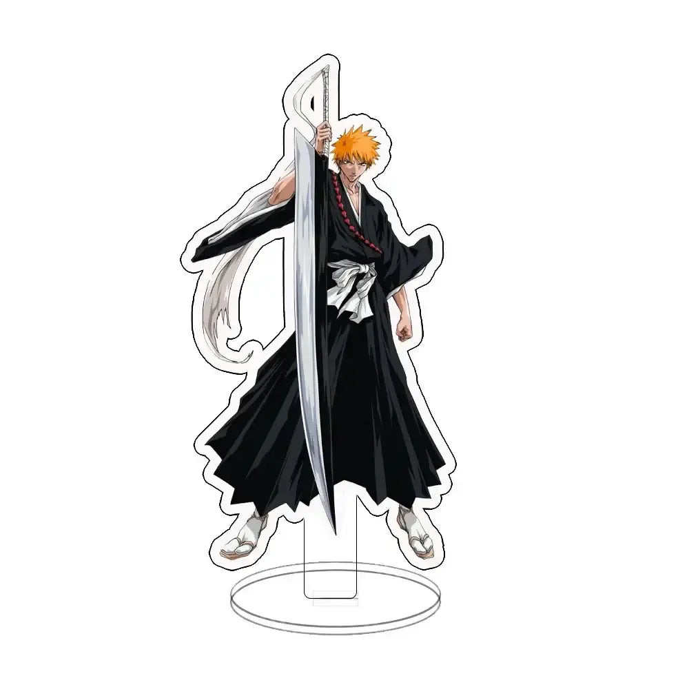 Clear acrylic ichigo acrylic standee featuring spiky orange hair anime character in black robe holding silver sword for desk display