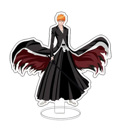 Black and red ichigo acrylic standee with orange hair holding sword in long black coat white trim for desk display