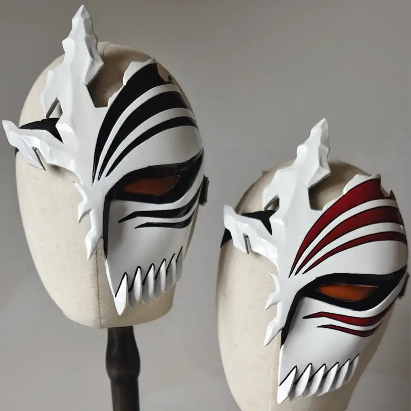 White intricately designed bleach ichigo hollow mask with black and red stripes and sharp teeth for cosplay use