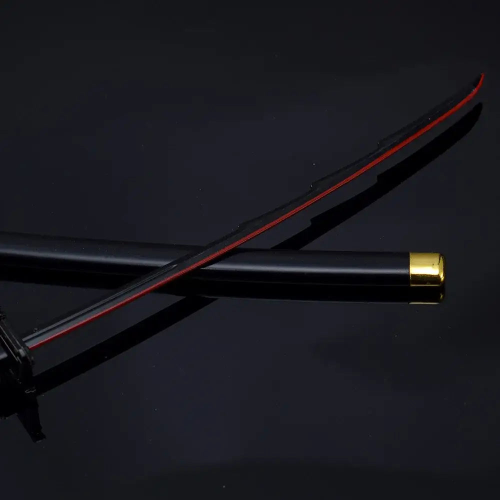 Bleach ichigo katana 25cm metal sword with black zinc alloy blade red lining and gold-tipped handle on black scabbard