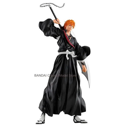 Black and white armored ichigo kurosaki grandista pvc figure with orange hair wearing black robe and holding chain-wrapped sword