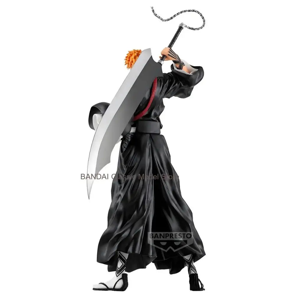 Black and white ichigo kurosaki grandista pvc figure with orange hair holding a large silver sword with chain