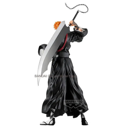 Black and white ichigo kurosaki grandista pvc figure with orange hair holding a large silver sword with chain