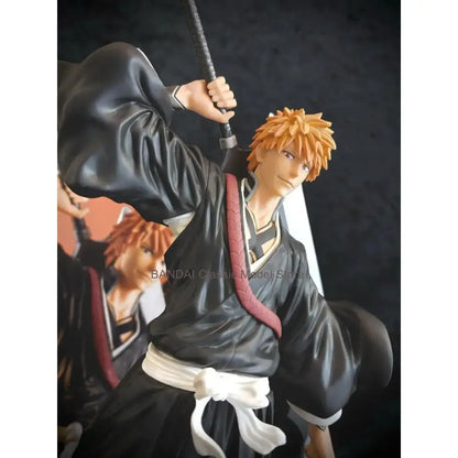 Bleach ichigo kurosaki grandista pvc figure featuring orange hair and black robe with red sash and white obi details