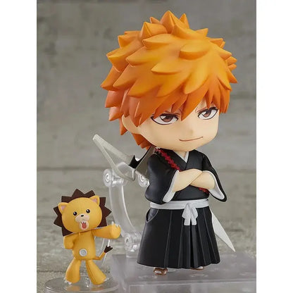 Bleach ichigo kurosaki pvc figure 10cm with orange spiky hair in black and white uniform standing with yellow lion companion