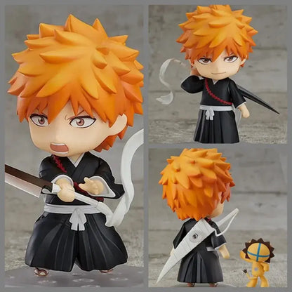 Bleach ichigo kurosaki pvc figure featuring orange spiky hair in black uniform with white sash and red trim holding a sword