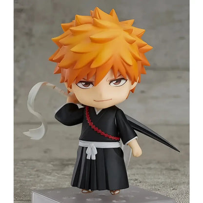 Bleach ichigo kurosaki 10cm pvc figure with orange spiky hair in black traditional outfit holding a sword hilt boxed