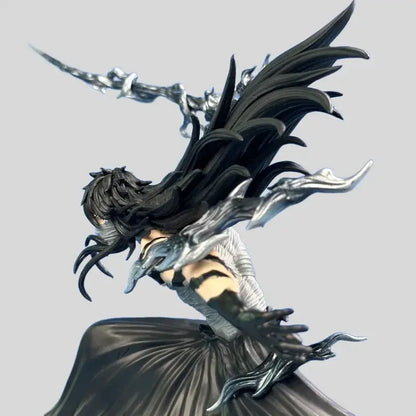 Black and silver pvc statue of bleach ichigo kurosaki with long dark hair wings and sword in moonless combat pose