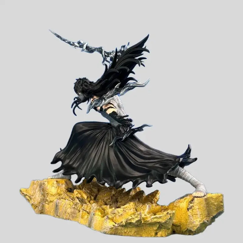 Black and silver bleach ichigo kurosaki pvc statue with long dark hair and ornate armor in moonless combat pose on yellow rock base