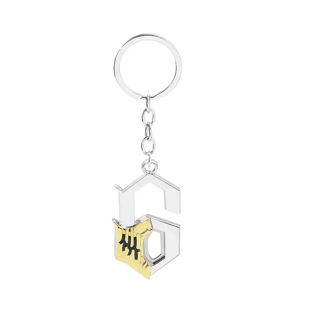 Silver and gold durable zinc alloy Bleach Ichigo mask necklace keychain with stylized g and black embroidered detailing