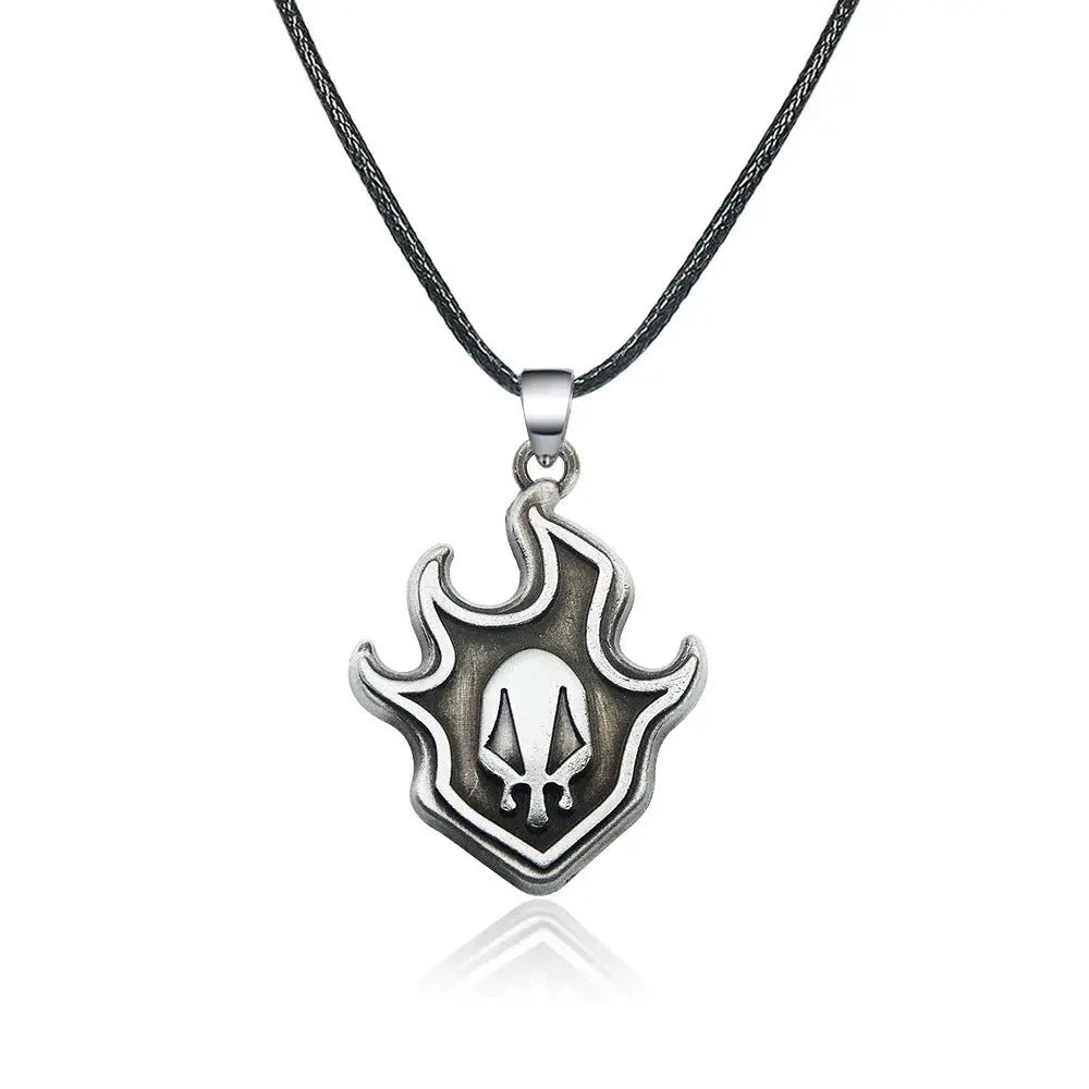 Silver flame-shaped bleach ichigo mask necklace with skull design on durable zinc alloy from black braided cord