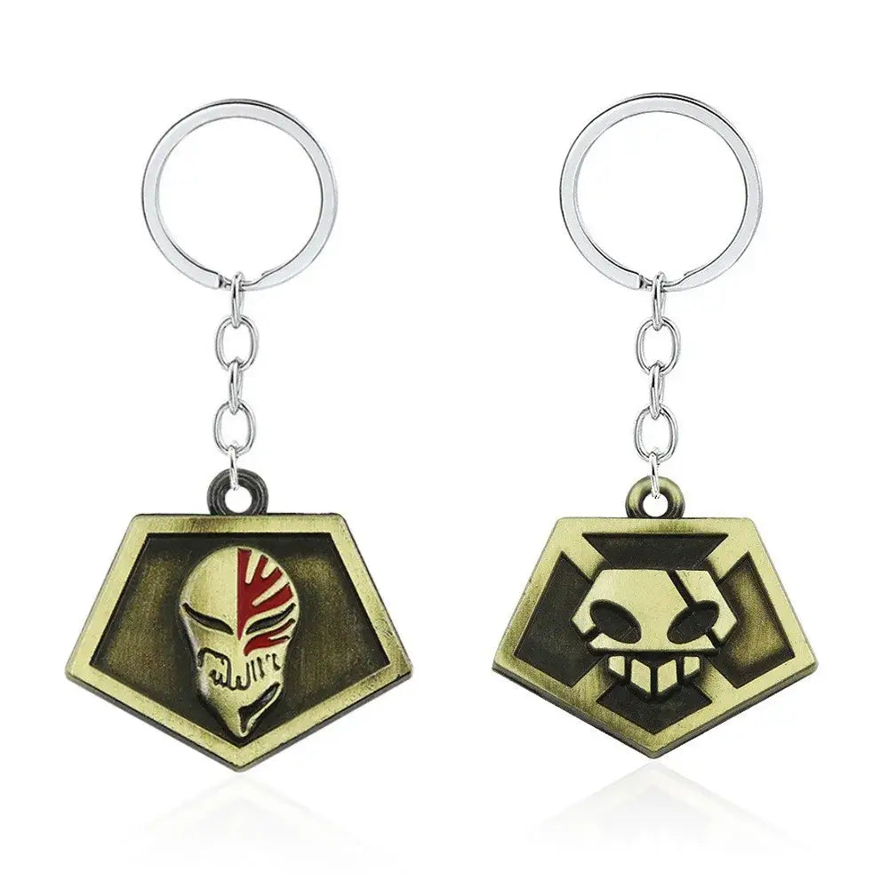 Two bleach ichigo mask necklace keychains in durable zinc alloy with gold-tone and black hexagonal skull pendants