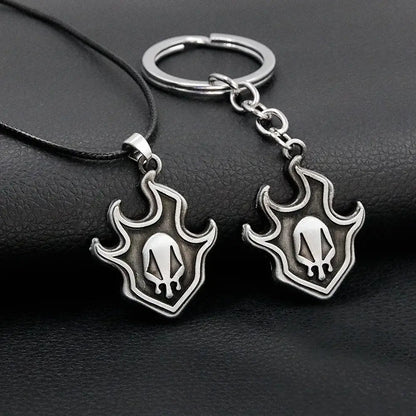 Silver flame-shaped bleach ichigo mask necklace and keychain with skull emblem made of durable zinc alloy