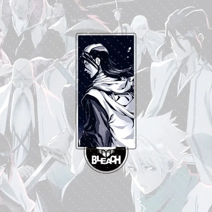 Bleach ichigo and orihime black and white acrylic stand figure in hooded cloak with rain effect on dark background