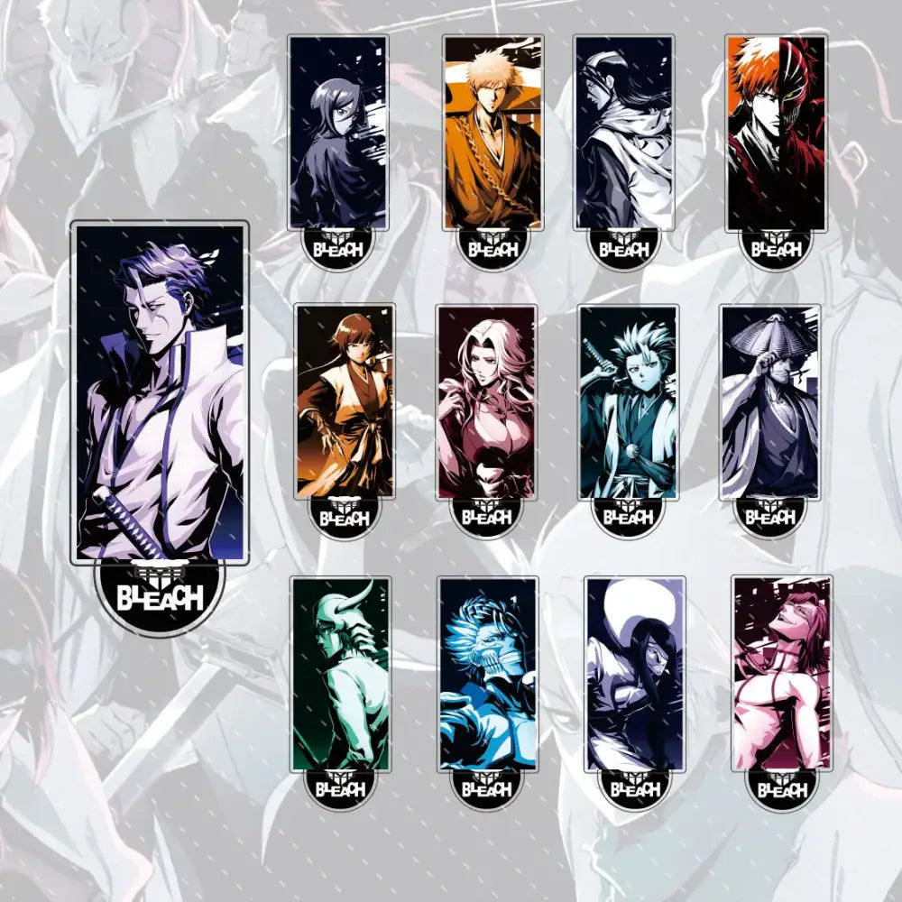 Set of ten colorful bleach anime character acrylic pins with black branding paired with a compact 15cm ichigo and orihime acrylic stand figure