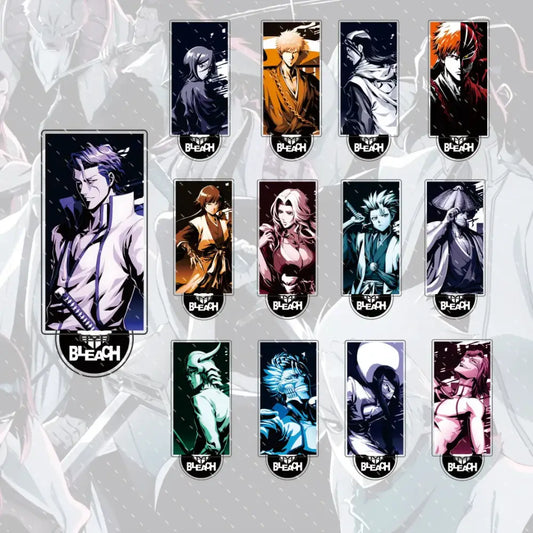 Set of ten colorful bleach anime character acrylic pins with black branding paired with a compact 15cm ichigo and orihime acrylic stand figure